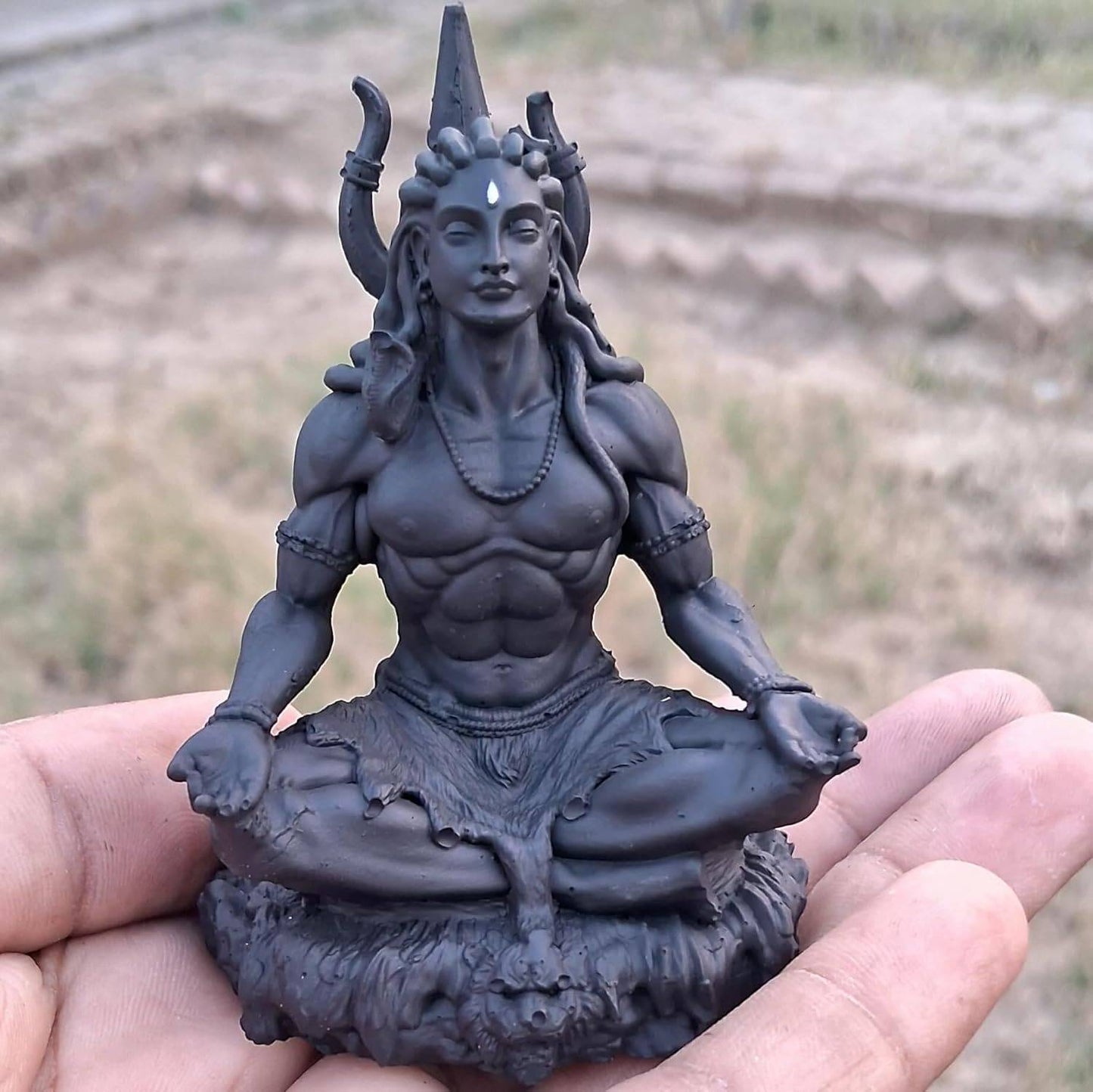 Handheld Adiyogi Meditation Statue showcasing intricate 3D printed UV resin detailing, perfect for table or altar decor.