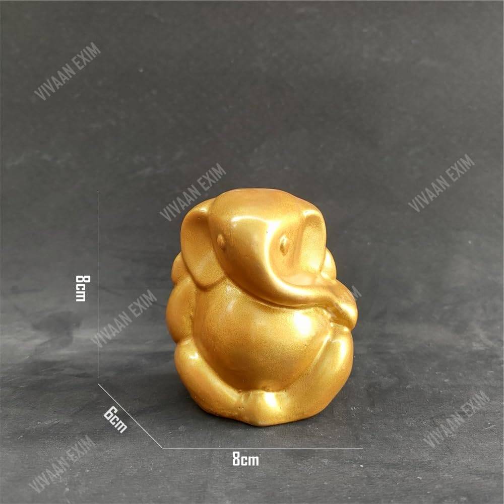 Ganesh statue Elegant Gold  Polyresin Statue - 8cm | Giftable Home and Car Decor - Decorwala 