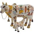 Kamdhenu Cow With Calf Hand Painted Polyresin Statue Of Hindu God (20 CM Size) featuring deities and gold accents, ideal for vastu decor.